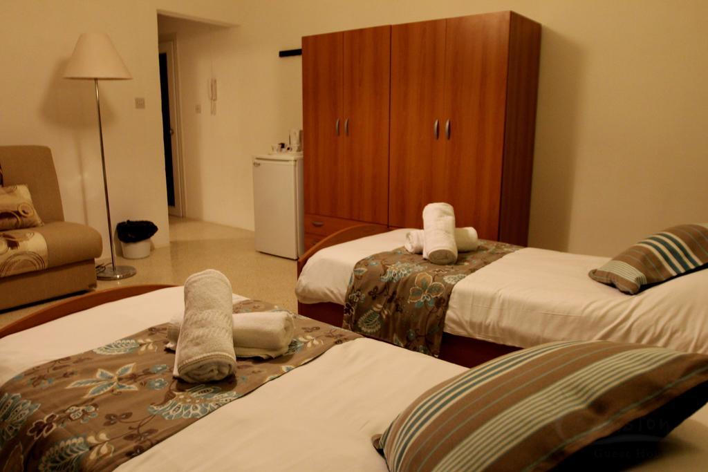 Sunstone Boutique Guest House Buġibba Szoba fotó